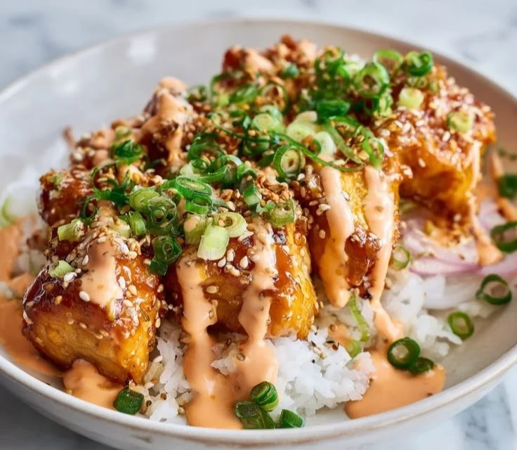 Bang Bang Chicken Bowl with crispy chicken and fresh vegetables