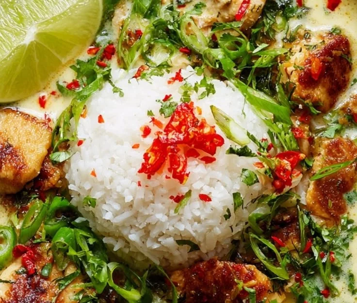 Coconut Chicken Brothy Rice bowl with herbs and spices, perfect for cozy meals.