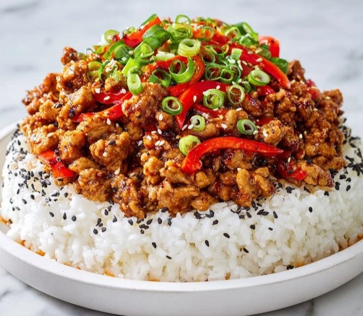 Firecracker Ground Chicken dish served in a bowl with colorful garnishes
