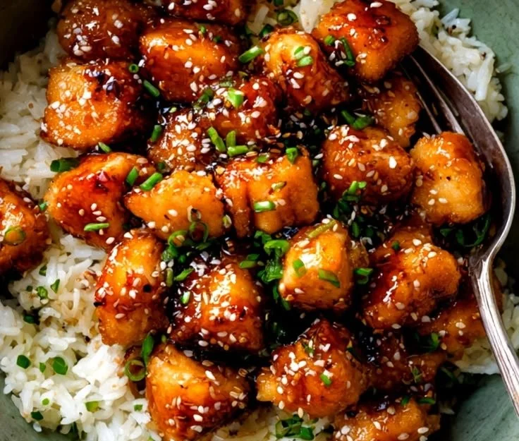 Honey Garlic Salmon Bites served on a plate with garnish
