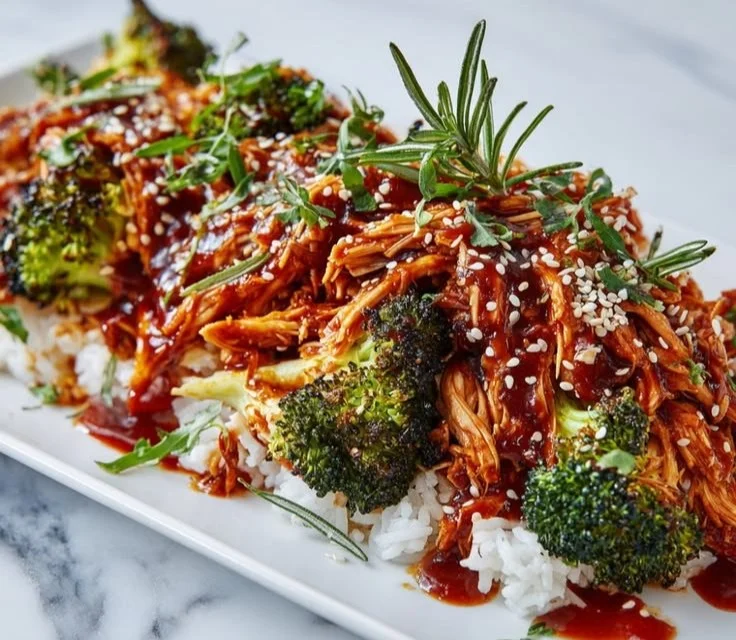 Protein-packed shredded chicken bowls with vegetables and grains for a hearty meal.