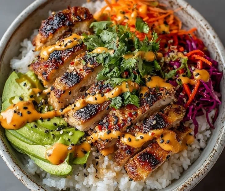 Plate of spicy maple chicken served with creamy coconut rice