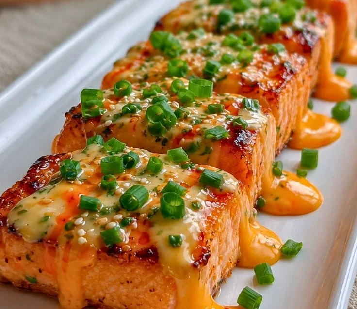 20-Minute Baked Bang Bang Salmon served with vegetables