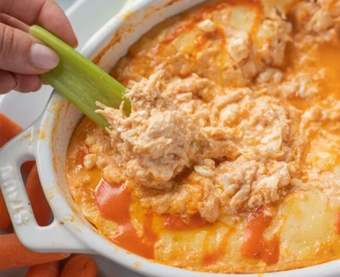 Healthy Cottage Cheese Buffalo Chicken Dip in a bowl ready to serve