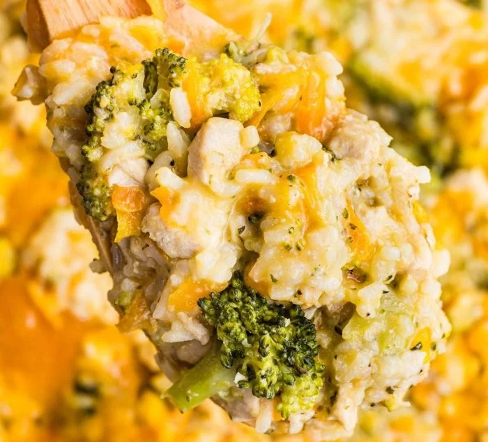 Creamy broccoli cheddar chicken and rice in a one-pot dish for a cozy meal.