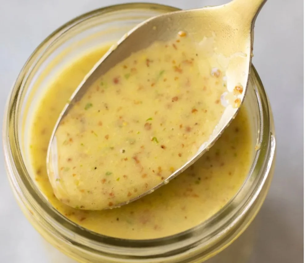 Creamy lemon dressing in a bowl, perfect for salads and quick recipes