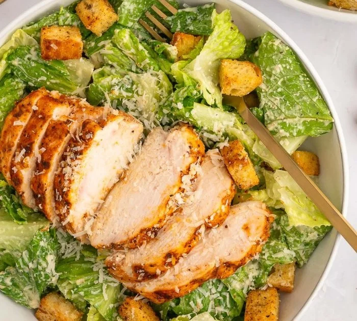 Bowl of easy homemade Caesar dressing without anchovies or eggs