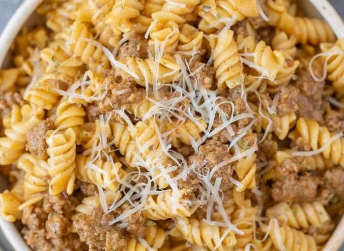 Healthy Hamburger Helper meal served in a bowl with veggies and pasta.