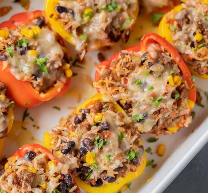 Healthy taco stuffed peppers filled with seasoned ground beef and vegetables