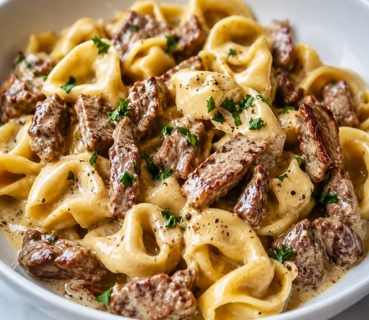 Delicious Philly cheesesteak tortellini pasta served in a bowl.